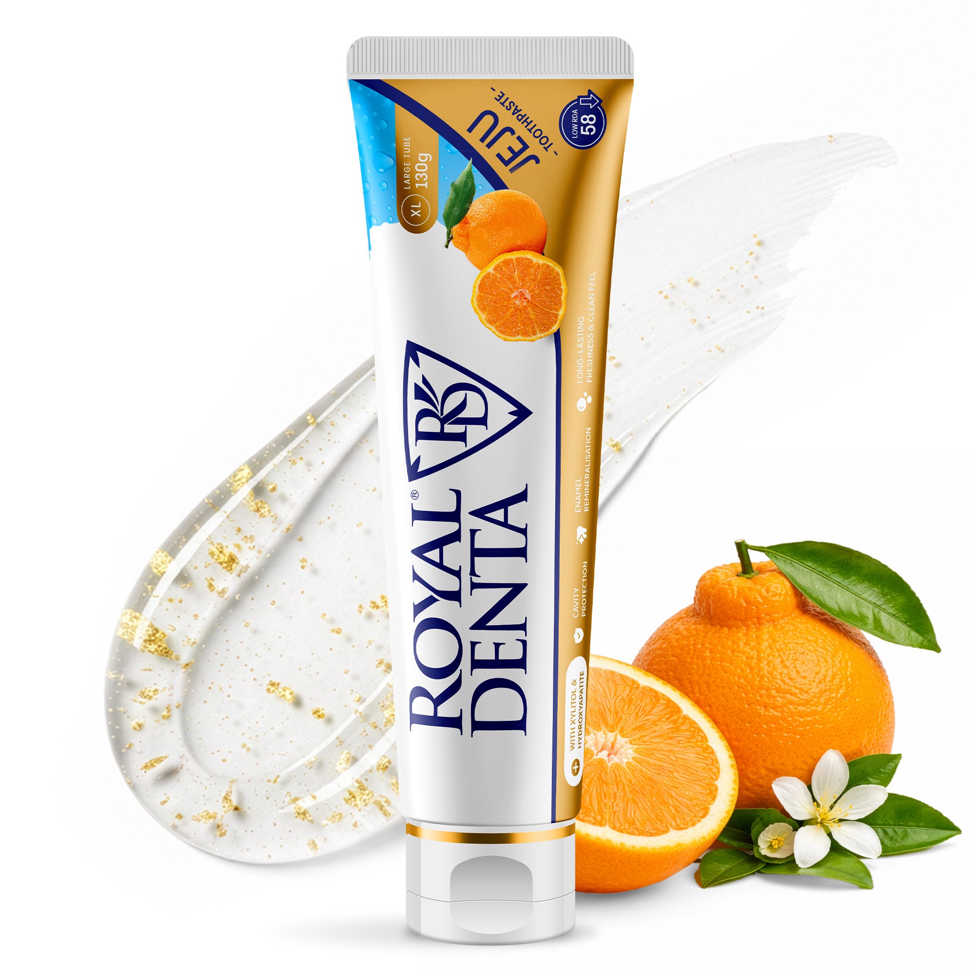 Tube of Royal Denta toothpaste with oranges and dental floss on a white background