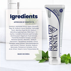 Royal Denta toothpaste tube with ingredients list on a white background and mint leaves